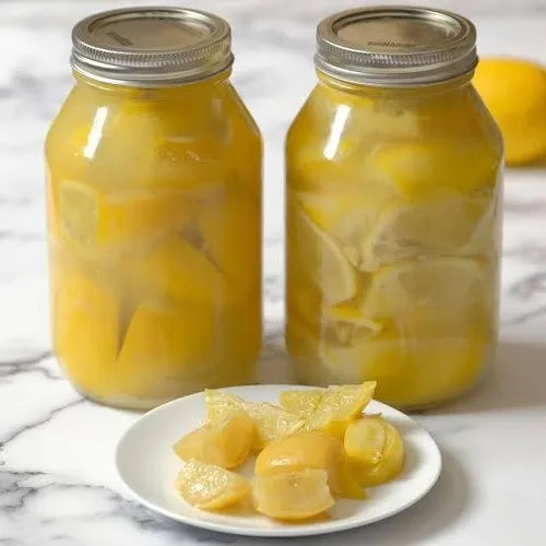 Brined lemon pieces in jar for pickling