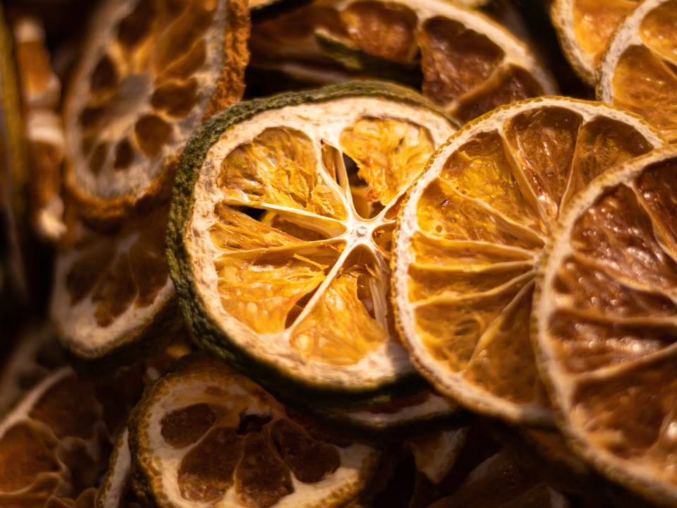 Close-up of dehydrated lemon slices with visible peel.